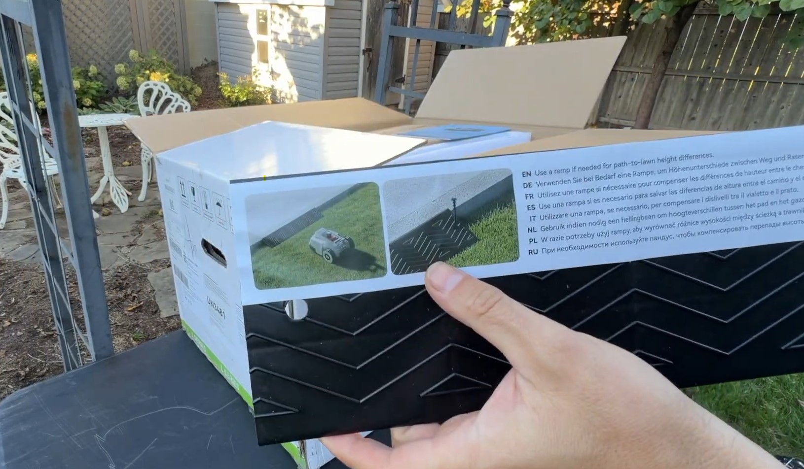 The included Lopkin ramp in its box, with instructions to use it for path-to-lawn height differences