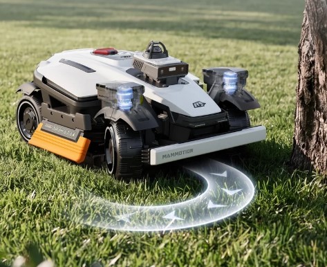 A Mammotion LUBA 4 AWD steering around a tree, with arcs showing its independent front-wheel steering