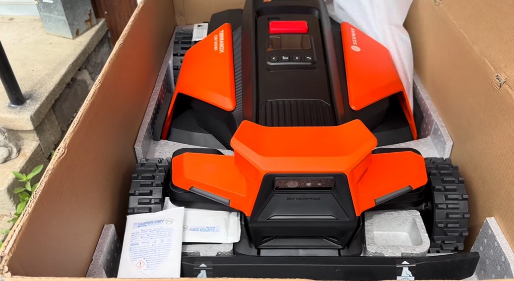A brand-new Segway Navimow Terranox commercial robot mower in its shipping box