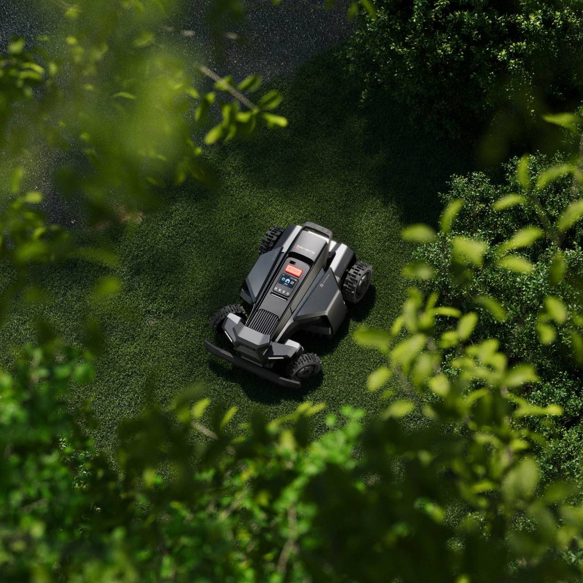 A robot mower on a lawn seen from above through green tree canopy